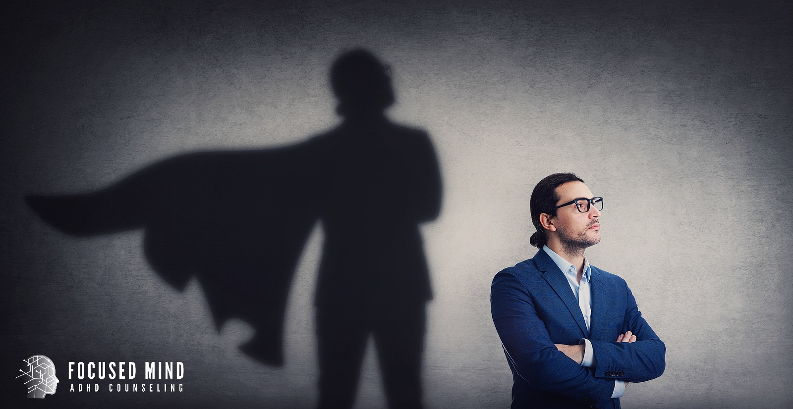 Image of a person standing confidently with a shadow of a super hero. You too can get control and confidence over your ADHD and Emotion Regulation. Reach out to a therapist in Columbus, Ohio today!
