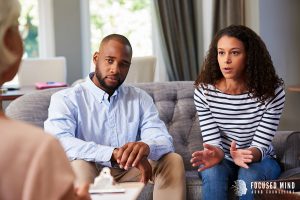 A couple discusses challenges with a therapist, focusing on communication in relationships, managing ADHD shutdown, and building emotional connection in therapy.