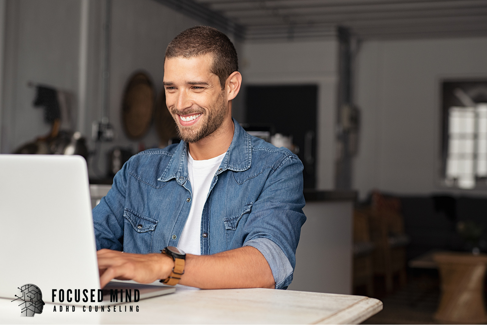 A man smiles while working on his laptop. Are you thinking about getting an ADHD assessment but aren't sure where to start? Online ADHD testing in Cincinnati, OH, offers accessible, convenient, and thorough evaluation.