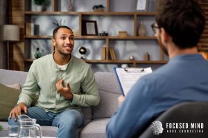 Therapist and client talking in a calm setting during an intake-style conversation. If you’re seeking adhd testing columbus ohio, connecting with an adhd therapist for adults near me or a columbus adhd therapist can help guide adult adhd testing in columbus, oh.