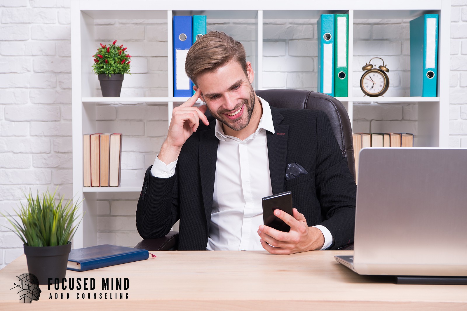 A smiling businessman sits at his desk. Could ADHD be the hidden factor shaping how you focus, make decisions, and thrive in your career? An ADHD specialist in Cincinnati, OH, can help you find clarity and move forward confidently.