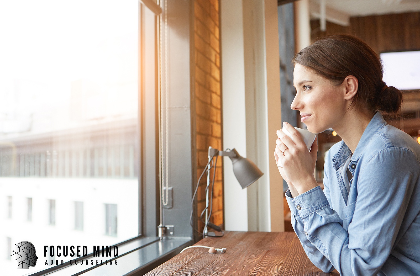 A woman holds a coffee cup and gazes thoughtfully out of a window. Is fear of failure keeping you from taking the first step toward understanding your ADHD? An ADHD specialist in Cincinnati, OH, can help you move forward with clarity and confidence.
